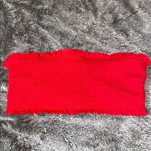 Red smocked bandeau bikini top